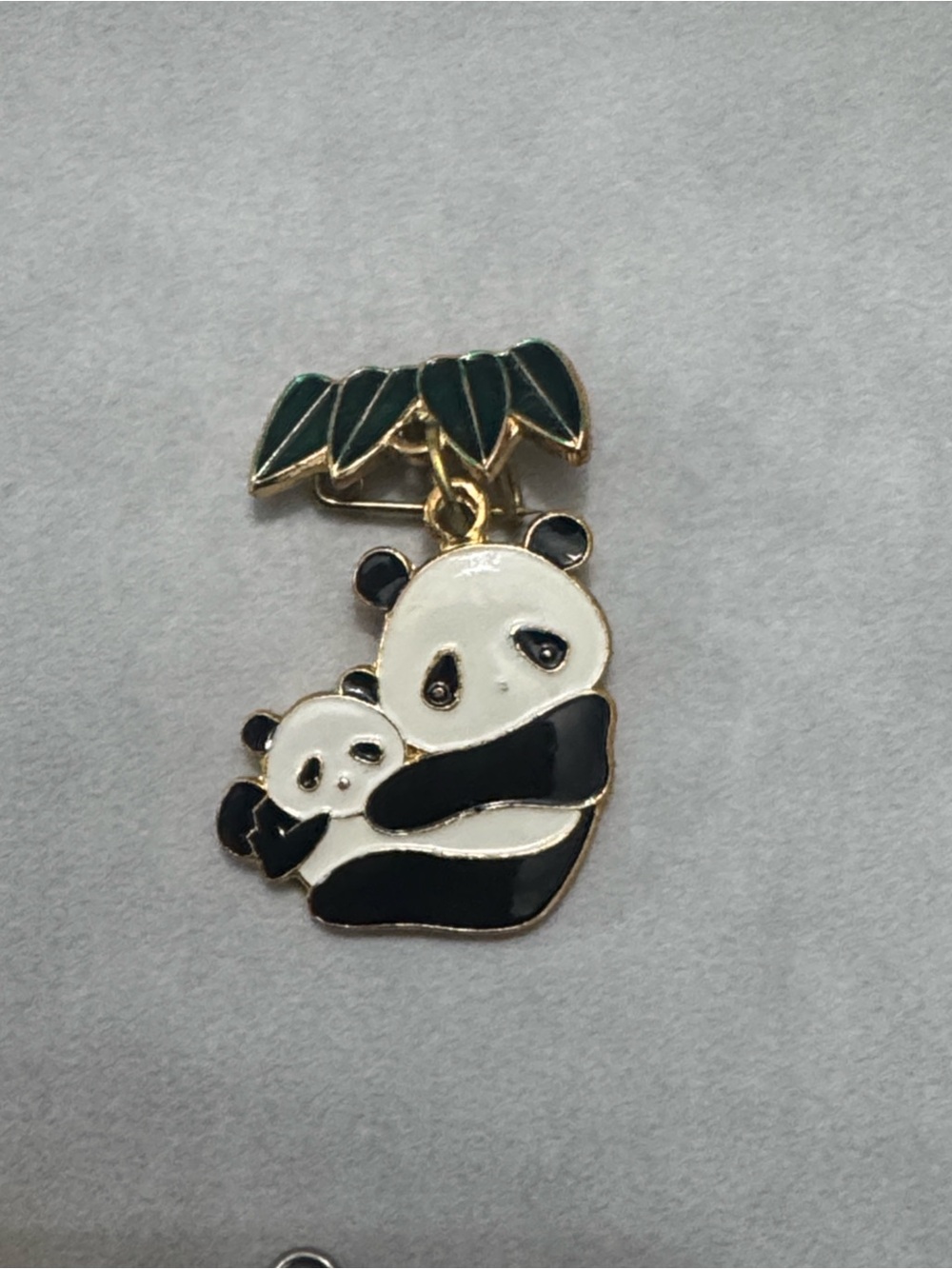 vintage gold-tone panda mom with baby enamel pin